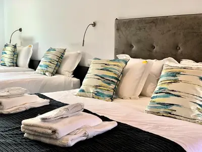 Cama o camas de una habitación en El Amparo