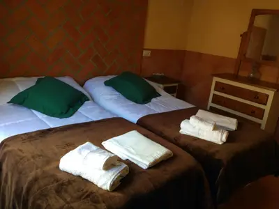 Cama o camas de una habitación en Casa Rural Sierra De Coripe