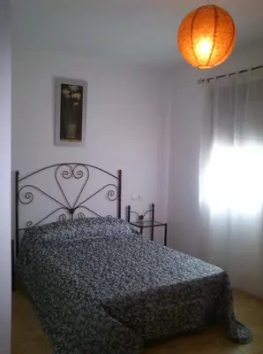 Cama o camas de una habitación en Alojamiento Rural la Veguetilla