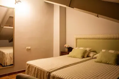 Cama o camas de una habitación en Casa Patio de los Arcos