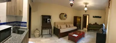 Zona de estar de Apartamentos Medina Qurtuba