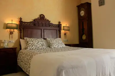 Cama o camas de una habitación en Apartamentos Medina Qurtuba
