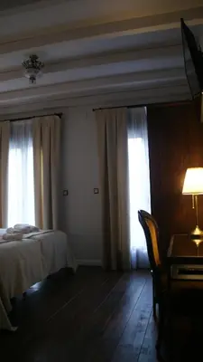 Cama o camas de una habitación en LANTIGUA CASA RURAL