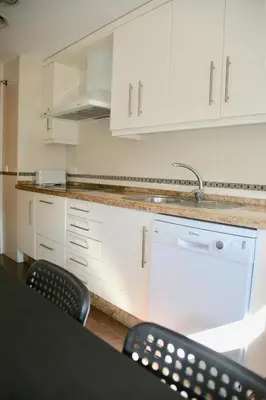 Una cocina o zona de cocina en Apartamento Ollerías, 31