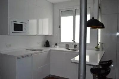 Una cocina o zona de cocina en Neverending Sevilla
