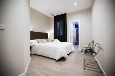 Cama o camas de una habitación en Conde de Gondomar 1
