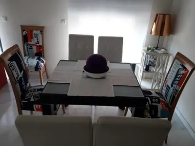 Zona de estar de Apartamento Las 4 Palmeras