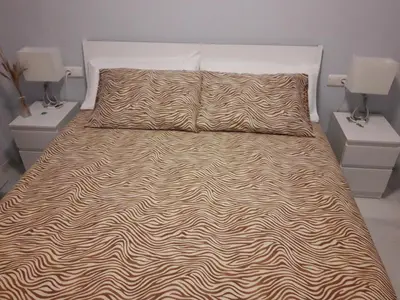 Cama o camas de una habitación en Apartamento Las 4 Palmeras