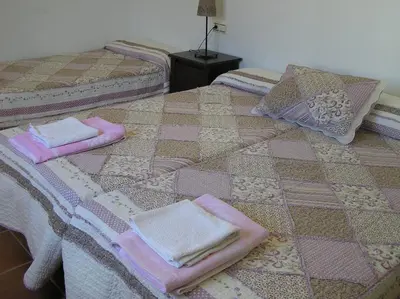 Cama o camas de una habitación en Alojamiento Rural El Chaparral