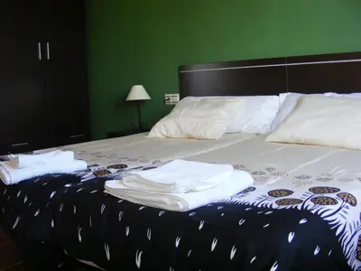Cama o camas de una habitación en Alojamiento Rural El Chaparral