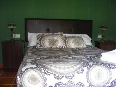 Cama o camas de una habitación en Alojamiento Rural El Chaparral