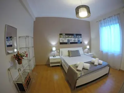 Cama o camas de una habitación en Eduardo Lucena 5, Los Patios