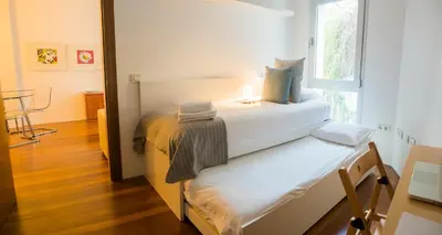 Cama o camas de una habitación en Precioso Apartamento con Parking en Pleno Centro