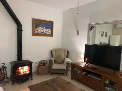 Una televisión o centro de entretenimiento en Apartamento Martín