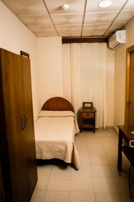 Cama o camas de una habitación en Hostal Restaurante El Paso