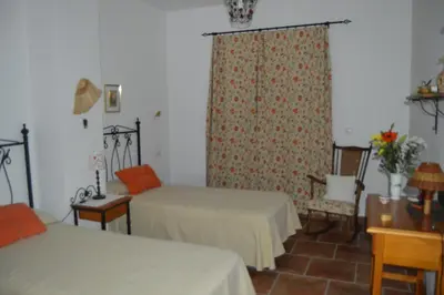 Cama o camas de una habitación en El Olivo del Moreno