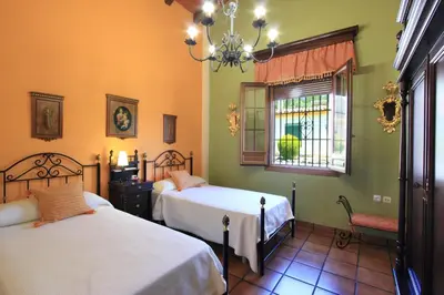Cama o camas de una habitación en Villa 'Los Balcones' - Villa Superior en Priego de Córdoba