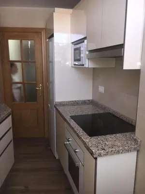 Una cocina o zona de cocina en Apartamento el Torreón