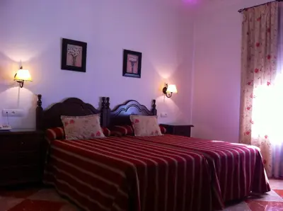 Cama o camas de una habitación en Hotel El Molino