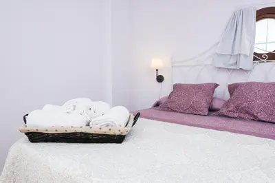 Cama o camas de una habitación en La torre Casa rural