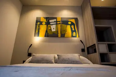 Cama o camas de una habitación en Hostal Sevilla Santa Justa - Adults only