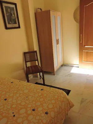 Cama o camas de una habitación en Casa Sevillana