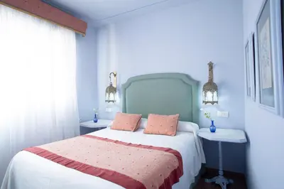 Cama o camas de una habitación en Hotel Rural Posada del Moro