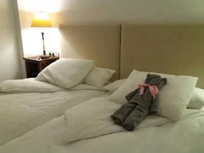 Cama o camas de una habitación en bt6sevilla