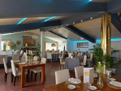Un restaurante o sitio para comer en Hotel Don Gonzalo