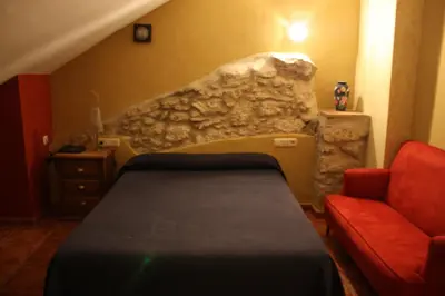 Cama o camas de una habitación en Hotel Don Pero