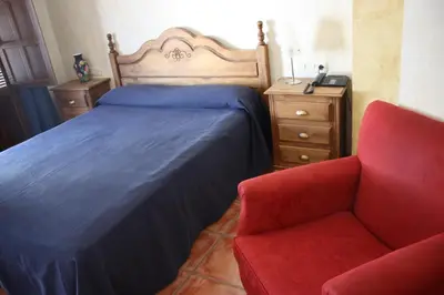 Cama o camas de una habitación en Hotel Don Pero