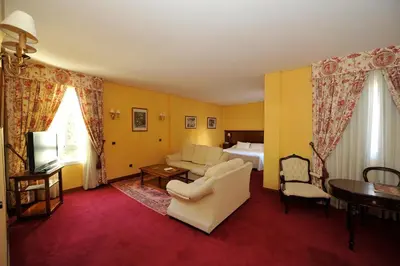 Cama o camas de una habitación en Hotel Lozano