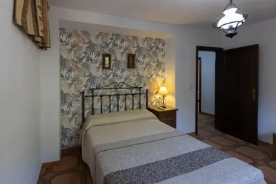 Cama o camas de una habitación en Cortijo el Chaparro