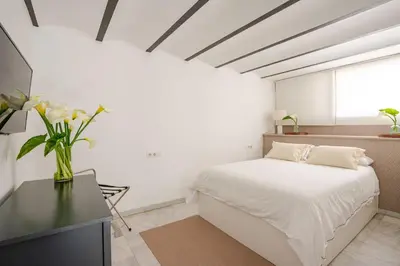 Cama o camas de una habitación en TYP Sevilla
