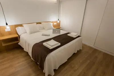 Cama o camas de una habitación en SunShine Arco de San Francisco