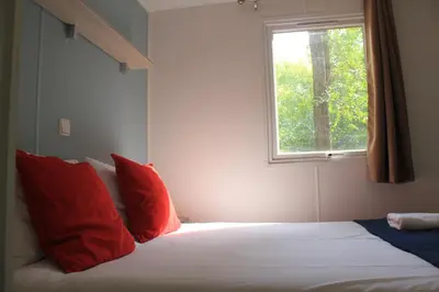 Cama o camas de una habitación en Camping La Fundicion