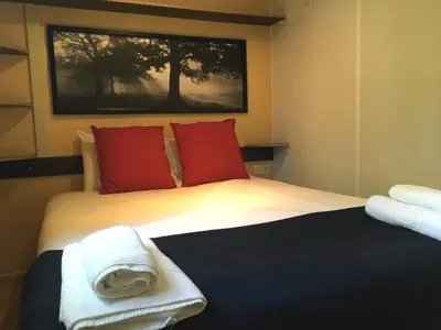 Cama o camas de una habitación en Camping La Fundicion