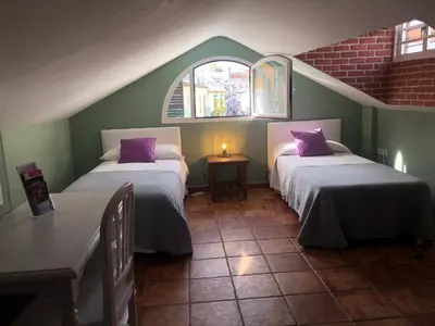 Cama o camas de una habitación en DS Ático 5