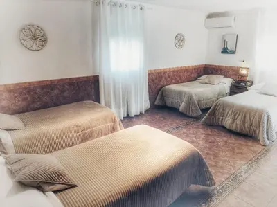 Cama o camas de una habitación en Casa Rural El Olmo