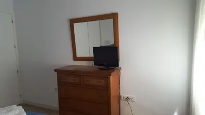 Una televisión o centro de entretenimiento en Apart. Céntrico San Miguel