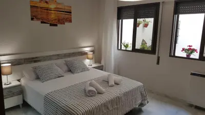 Cama o camas de una habitación en Apartamento entre Patios Valladares