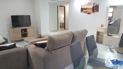 Una televisión o centro de entretenimiento en Apartamento entre Patios Valladares