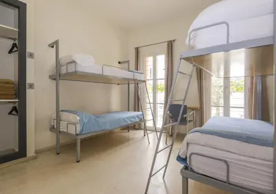 Cama o camas de una habitación en Albergue Inturjoven Córdoba