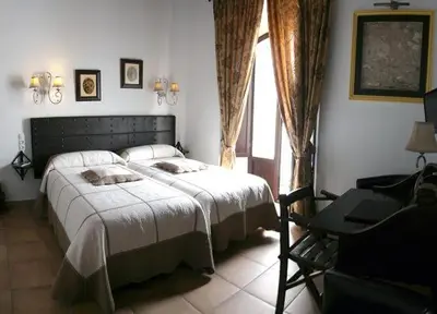 Cama o camas de una habitación en La Posada Del Infante