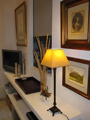 Una televisión o centro de entretenimiento en APARTAMENTO EN CENTRO HISTÓRICO con PARKING GRATIS