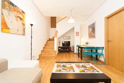 Zona de estar de La Casa del Conde de Gelves Apartments