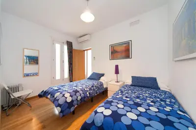 Cama o camas de una habitación en La Casa del Conde de Gelves Apartments