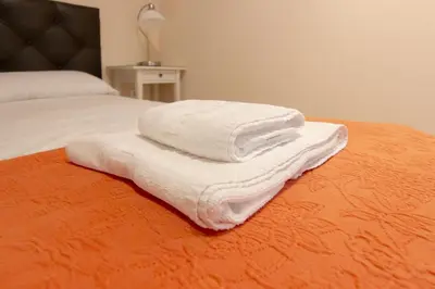 Cama o camas de una habitación en RentalSevilla Cano y Cueto III