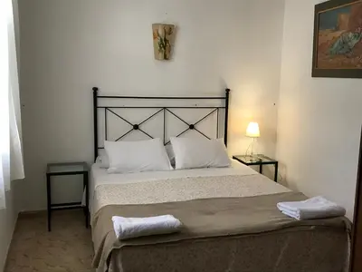 Cama o camas de una habitación en Pension el Portillo