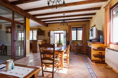 Una televisión o centro de entretenimiento en Comfortable House in Carcabuey with Private Pool